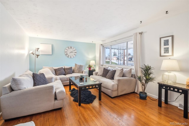 living room featuring hardwood / wood-style floors