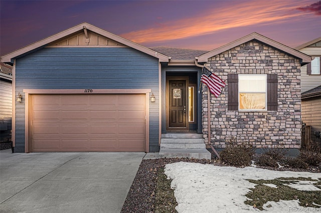 view of front of property with a garage