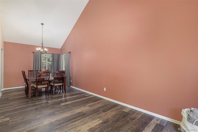 dining area featuring a notable chandelier, high vaulted ceiling, and dark hardwood / wood-style flooring