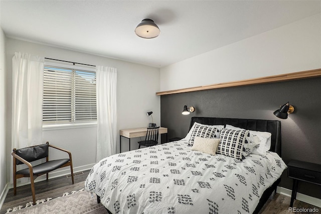 bedroom featuring dark hardwood / wood-style floors