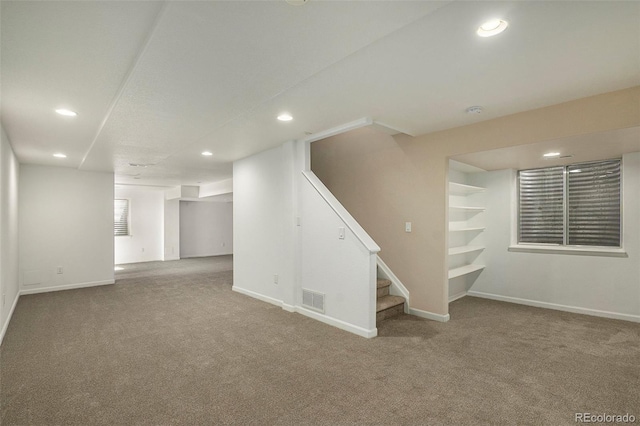 basement featuring carpet floors