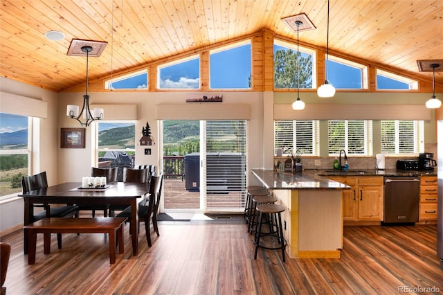 1301 Sheep Ridge Rd, Fairplay, CO 80440 - dining space with wood ceiling, vaulted ceiling, dark wood-style flooring, and a chandelier