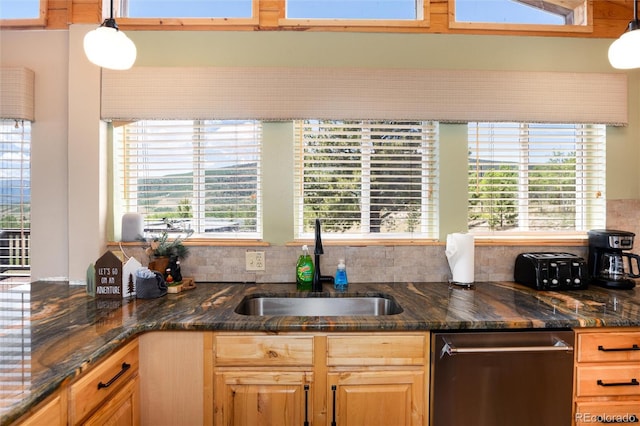 1301 Sheep Ridge Rd, Fairplay, CO 80440 - kitchen featuring dishwasher, healthy amount of natural light, dark stone countertops, and decorative light fixtures