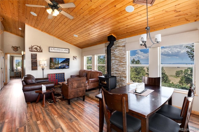 1301 Sheep Ridge Rd, Fairplay, CO 80440 - dining area featuring a wood stove, wood finished floors, wooden ceiling, ceiling fan, and vaulted ceiling