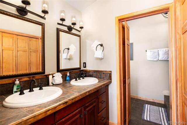 1301 Sheep Ridge Rd, Fairplay, CO 80440 - bathroom featuring double vanity and tile patterned floors
