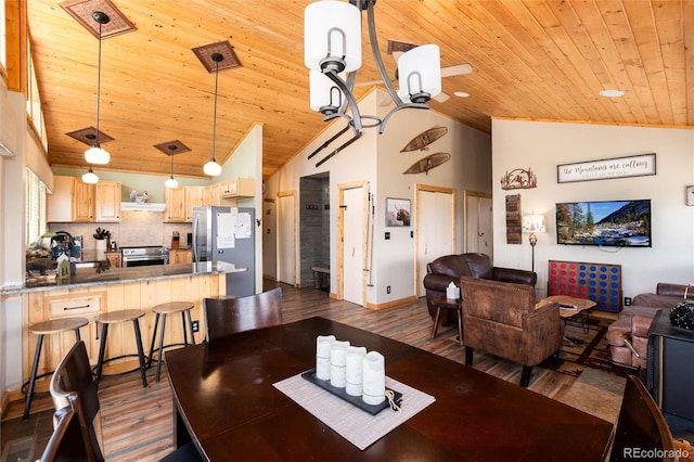 1301 Sheep Ridge Rd, Fairplay, CO 80440 - dining space featuring wood ceiling, high vaulted ceiling, and dark wood-style floors