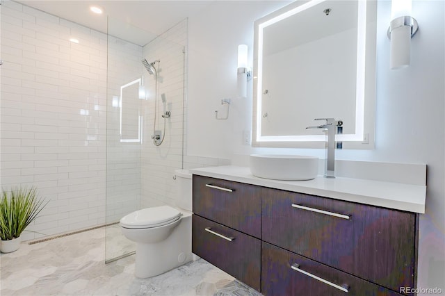 1555 California St Unit 605, Denver, CO 80202 - full bath featuring a walk in shower, vanity, and toilet
