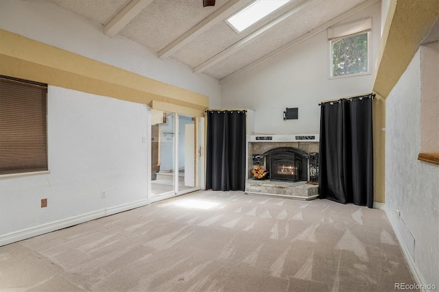 7210 Otis Ct, Arvada, CO 80003 - unfurnished living room featuring carpet, beamed ceiling, high vaulted ceiling, and a fireplace