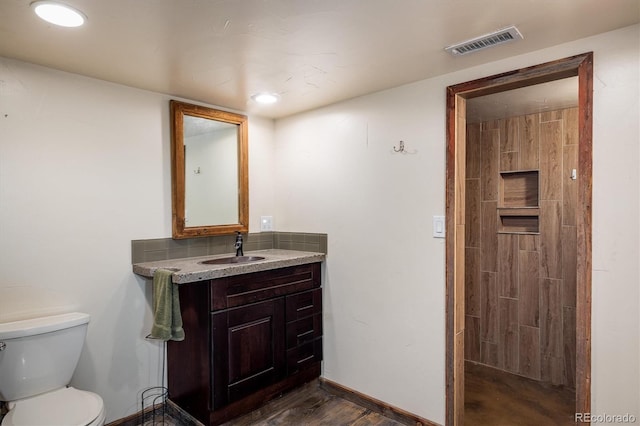 7210 Otis Ct, Arvada, CO 80003 - bathroom featuring vanity and wood finished floors