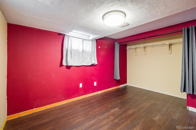 7210 Otis Ct, Arvada, CO 80003 - unfurnished bedroom with wood finished floors, a textured ceiling, and a closet