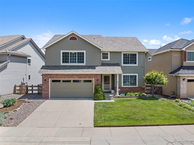 42 Blue Sage, Littleton, CO 80127 - traditional-style home with brick siding, a garage, concrete driveway, a shingled roof, and a gate