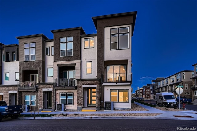 multi unit property with central AC and stucco siding