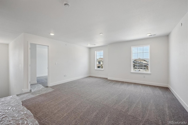 1376 Lumber Ridge Cir N, Erie, CO 80516 - empty room featuring a smoke detector, baseboards, and carpet floors