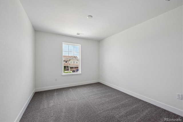 1376 Lumber Ridge Cir N, Erie, CO 80516 - unfurnished room featuring dark carpet and baseboards