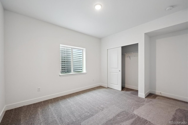 1376 Lumber Ridge Cir N, Erie, CO 80516 - unfurnished bedroom featuring carpet, baseboards, and a closet