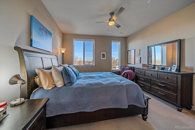 carpeted bedroom with ceiling fan