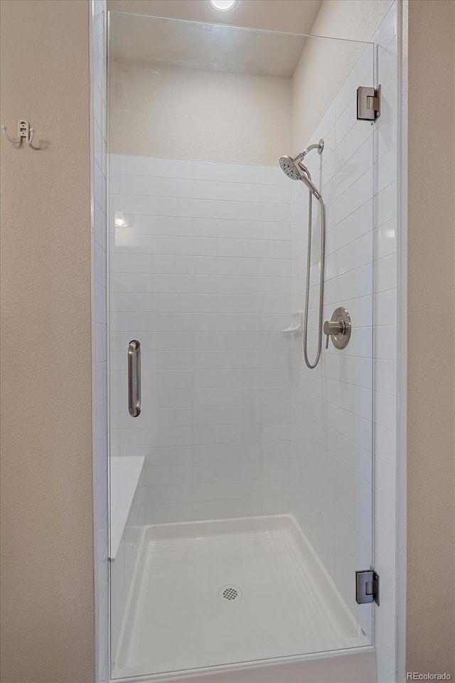 bathroom with an enclosed shower