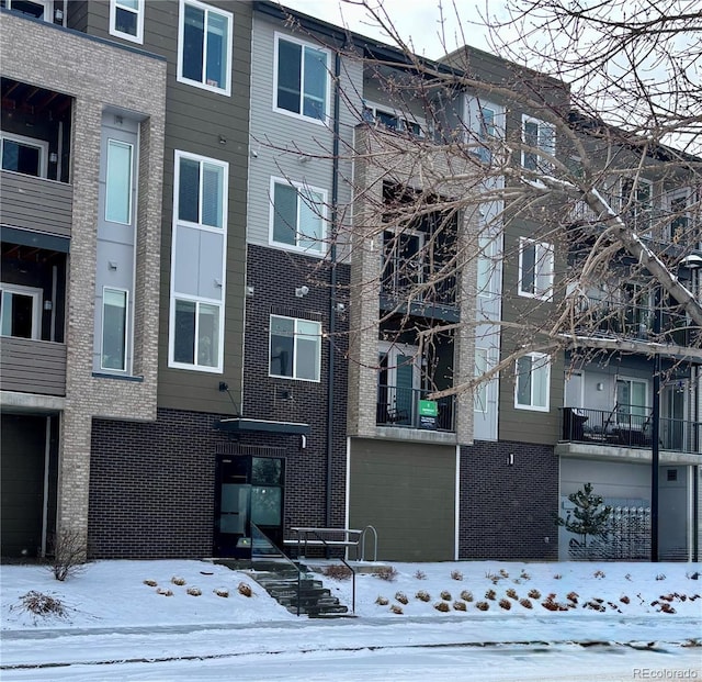 view of snow covered building