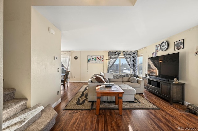 living room with dark hardwood / wood-style floors