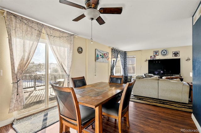 dining room with dark hardwood / wood-style floors and ceiling fan