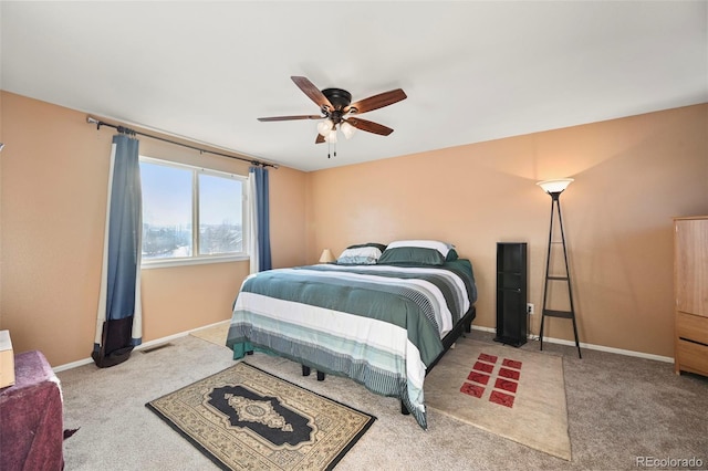 bedroom with ceiling fan and carpet flooring