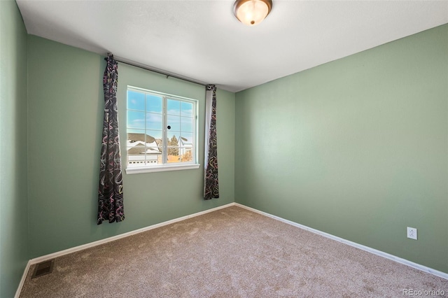 view of carpeted spare room