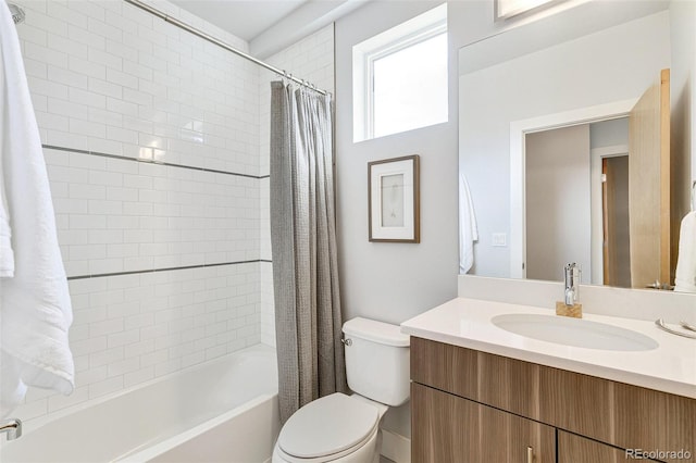 full bathroom with vanity, toilet, and shower / bath combo