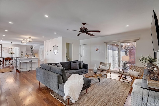 3434 S Race St, Englewood, CO 80113 - living area with a chandelier, wood finished floors, recessed lighting, ceiling fan, and stairs