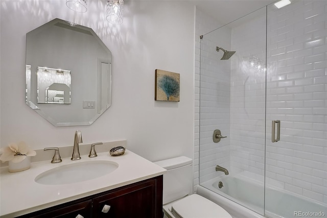 3434 S Race St, Englewood, CO 80113 - bathroom featuring vanity and shower / bath combination with glass door