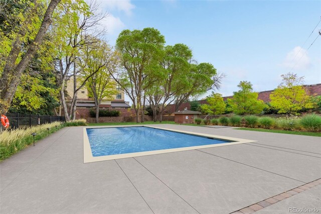 3434 S Race St, Englewood, CO 80113 - view of swimming pool with a patio area
