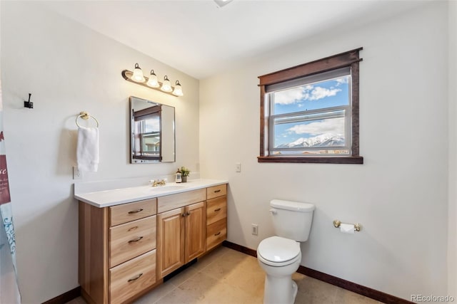 16651 Holly Ct, Buena Vista, CO 81211 - full bathroom featuring toilet, vanity, and baseboards
