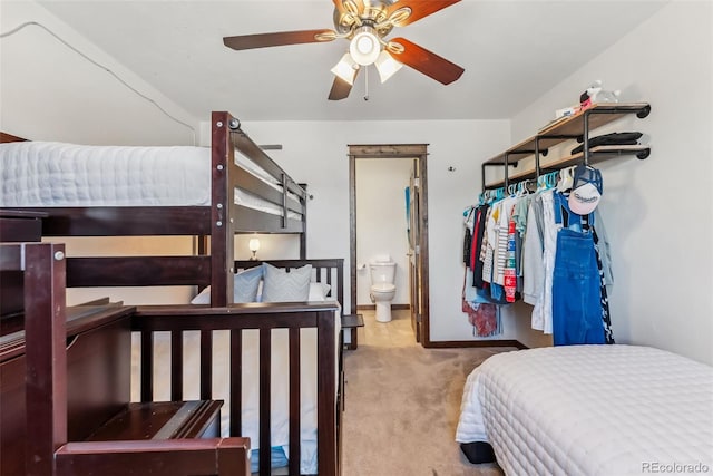 16651 Holly Ct, Buena Vista, CO 81211 - bedroom featuring carpet floors, ensuite bathroom, baseboards, and ceiling fan