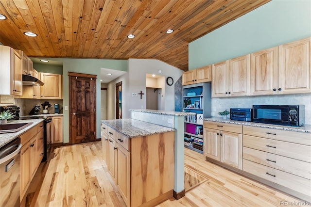 16651 Holly Ct, Buena Vista, CO 81211 - kitchen featuring black microwave, light brown cabinetry, dishwasher, exhaust hood, and a kitchen island
