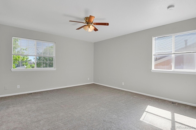 9690 Lansing Cir, Commerce City, CO 80022 - unfurnished room featuring ceiling fan, a smoke detector, carpet floors, and baseboards