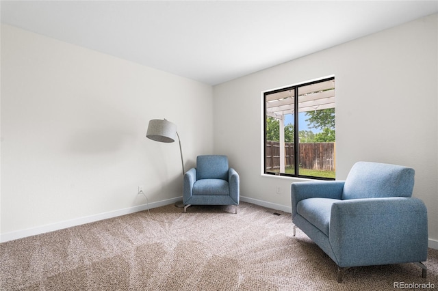 5991 W 68th Ave, Arvada, CO 80003 - sitting room featuring baseboards and carpet