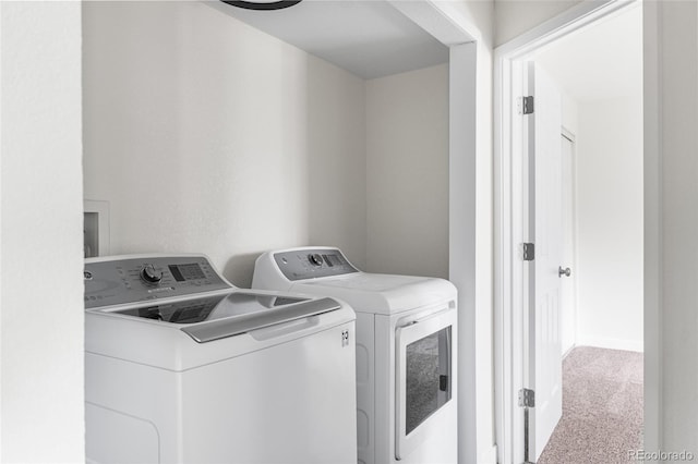 5991 W 68th Ave, Arvada, CO 80003 - laundry area featuring washing machine and dryer and carpet flooring