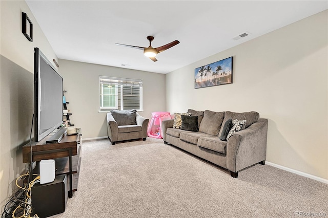 4733 S Wenatchee Cir, Aurora, CO 80015 - living area with light carpet, ceiling fan, and baseboards