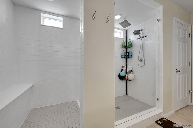 4733 S Wenatchee Cir, Aurora, CO 80015 - bathroom featuring tiled shower