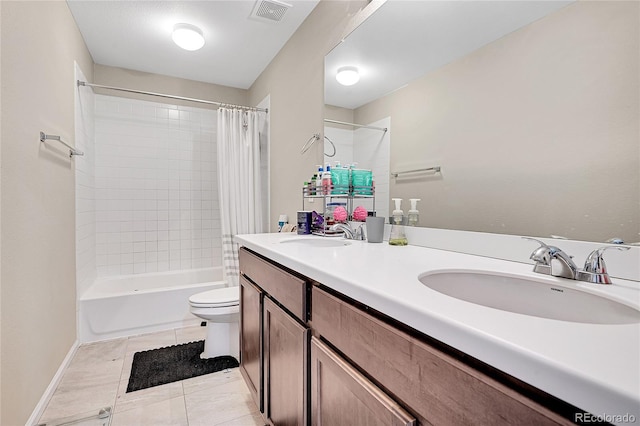 4733 S Wenatchee Cir, Aurora, CO 80015 - full bath with toilet, shower / bathtub combination with curtain, double vanity, and tile patterned floors