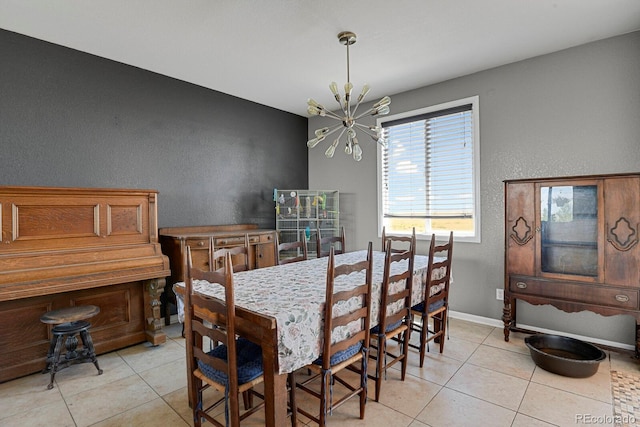 tiled dining area with an inviting chandelier