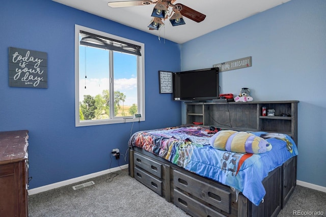 bedroom with ceiling fan and carpet floors