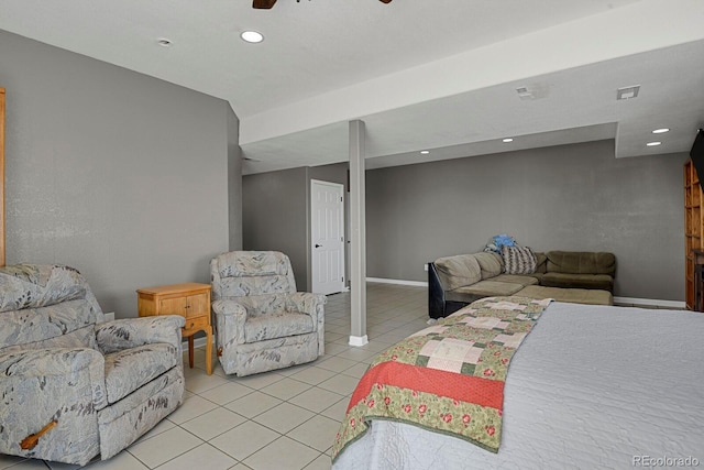 bedroom featuring ceiling fan and light tile patterned flooring