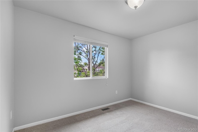 view of carpeted spare room