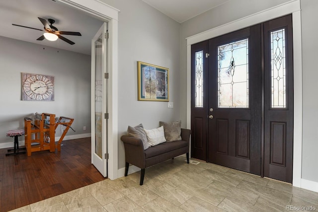 entrance foyer with hardwood / wood-style floors and ceiling fan