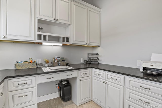 kitchen with white cabinetry