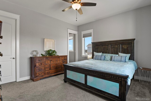 carpeted bedroom featuring ceiling fan