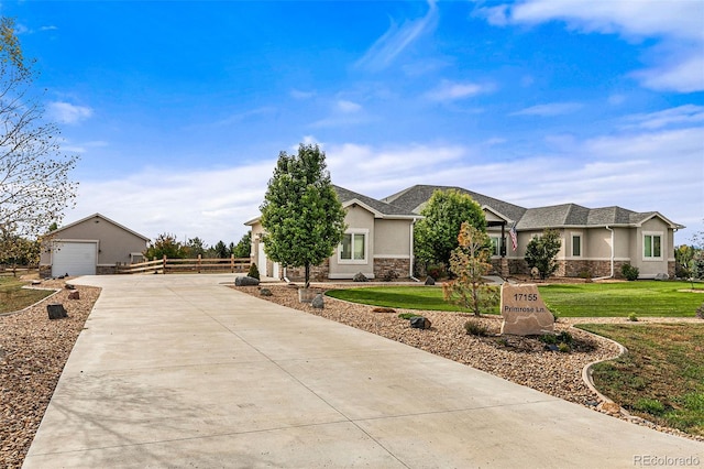 view of front of house with a front lawn and a garage