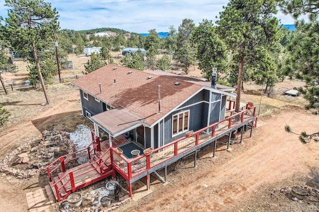 34886 Mohawk Trl, Pine, CO 80470 - rear view of property with a deck and roof with shingles