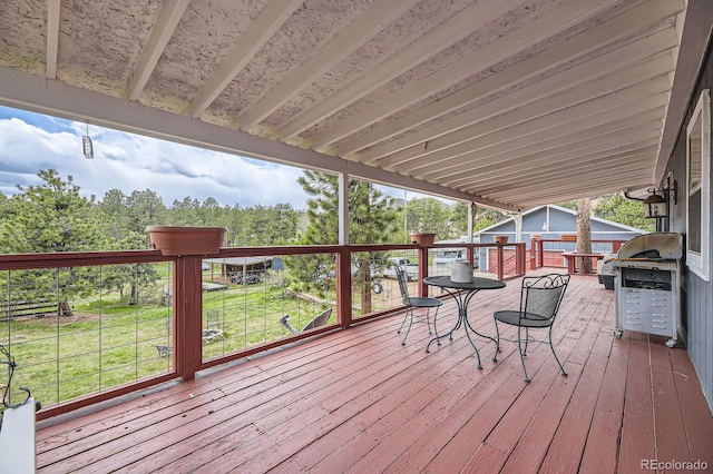 34886 Mohawk Trl, Pine, CO 80470 - wooden terrace with grilling area and a yard