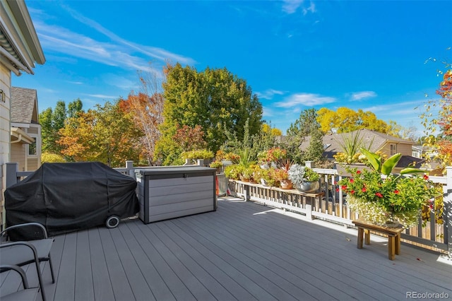 wooden deck with area for grilling